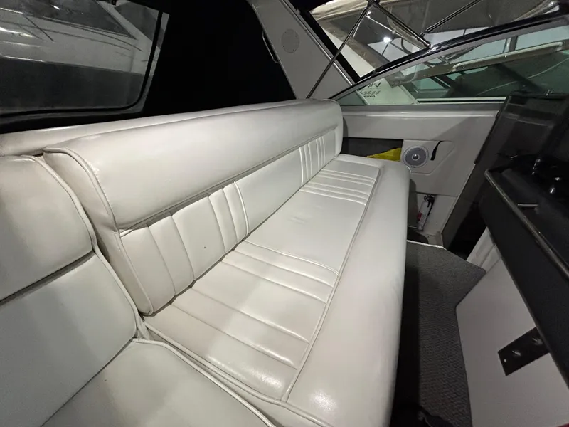 Slide: The Image of Interior of 1992 Sea Ray 370 Sundancer with white leather seating. - 21