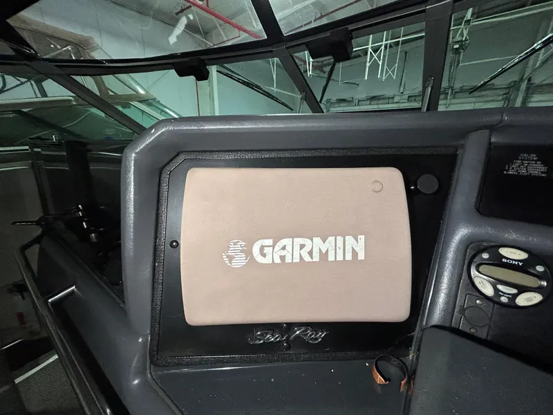 Slide: The Image of Dashboard of 1992 Sea Ray 370 Sundancer with Garmin navigation system. - 24