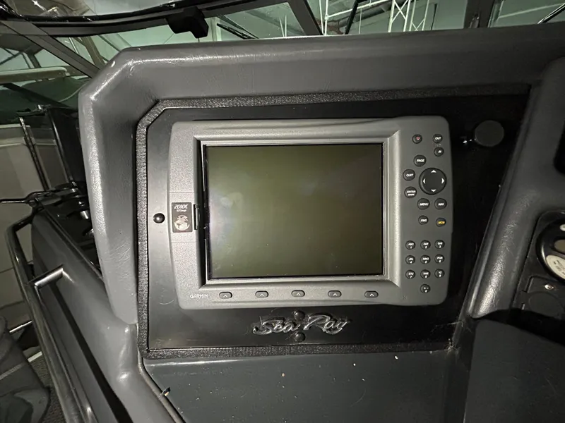 Slide: The Image of Control panel of a 1992 Sea Ray 370 Sundancer boat. - 25