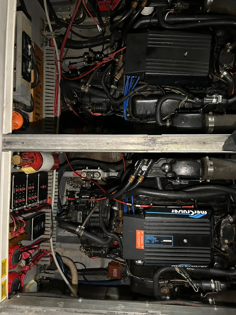Slide: The Image of Engine compartment of a 1992 Sea Ray 370 Sundancer with MerCruiser engines. - 39