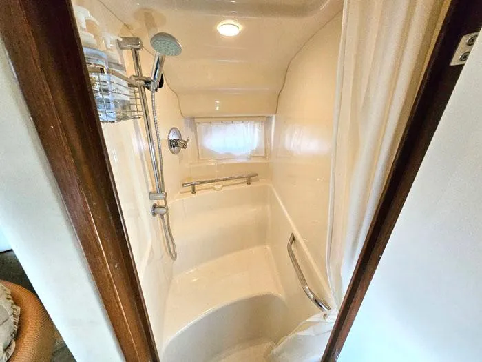 Slide: The Image of Shower area in 2007 Sea Ray 40 Sundancer yacht, featuring modern fixtures and lighting. - 16