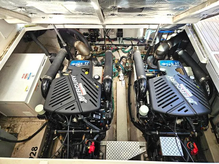 Slide: The Image of Engine room of a 2007 Sea Ray 40 Sundancer with twin Mercury engines. - 20
