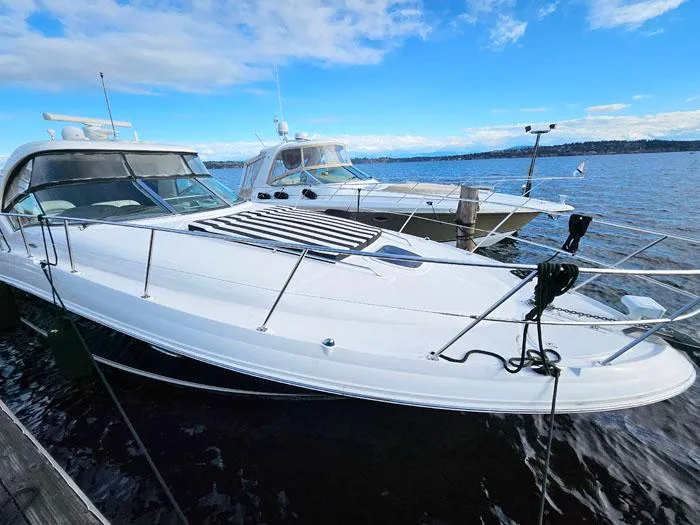 Slide: The Image of 2007 Sea Ray 40 Sundancer yacht docked on a sunny day with clear skies. - 3