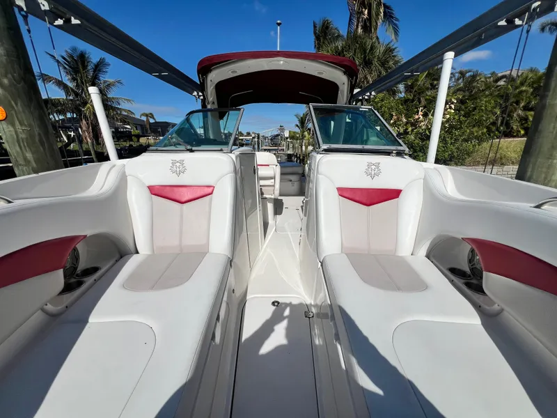Slide: The Image of 2015 Chaparral 287 SSX boat interior with white and red seating. - 12