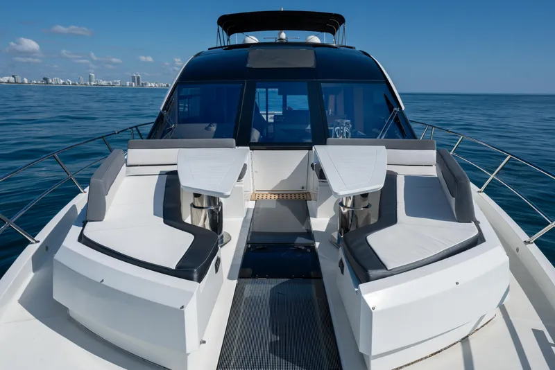 Slide: The Image of 2019 Galeon 650 Sky yacht with luxurious seating on open sea. - 19