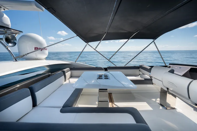 Slide: The Image of Luxurious 2019 Galeon 650 Sky yacht interior with ocean view and sleek seating area. - 20