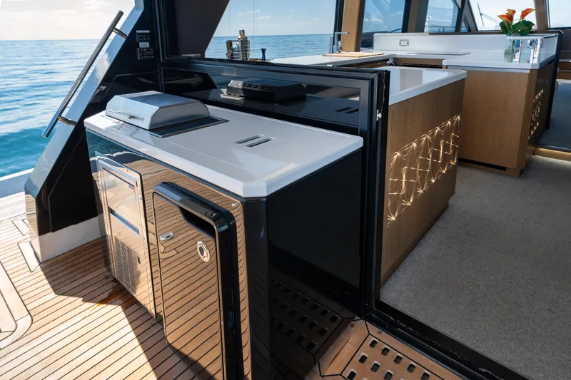 Slide: The Image of Luxurious 2019 Galeon 650 Sky yacht interior with modern kitchen and ocean view. - 27