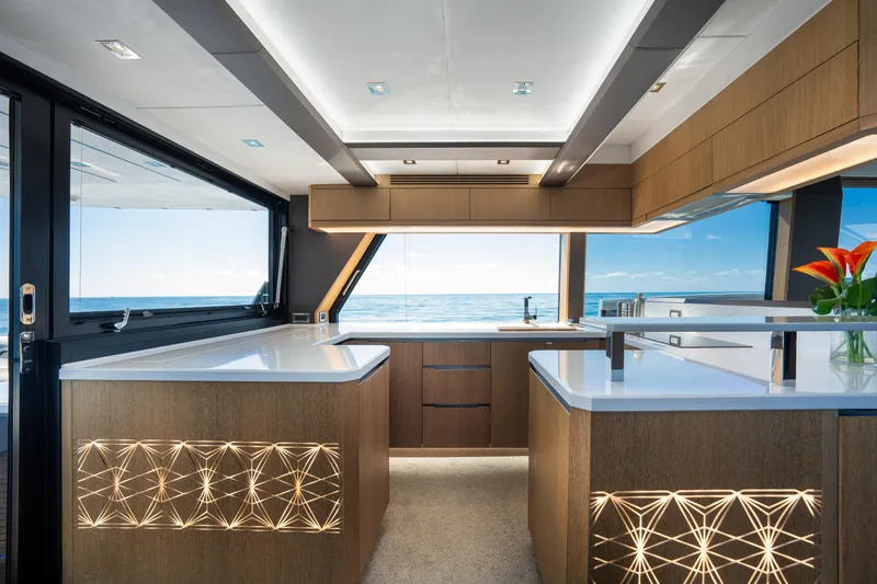 Slide: The Image of Luxurious interior of 2019 Galeon 650 Sky yacht with modern kitchen design. - 29