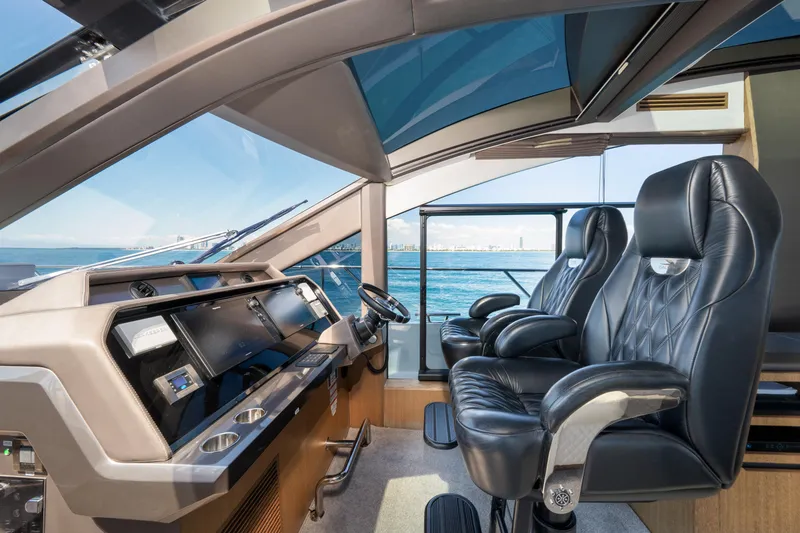 Slide: The Image of Luxurious interior of 2019 Galeon 650 Sky yacht with leather seats and modern dashboard. - 32