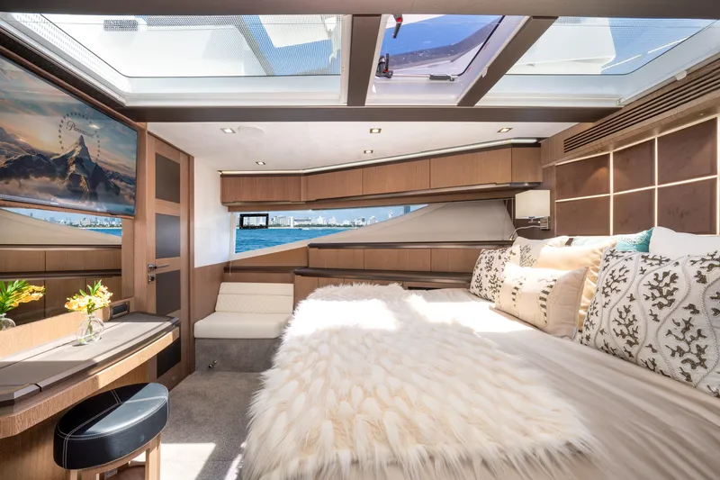 Slide: The Image of Luxurious interior of 2019 Galeon 650 Sky yacht with elegant decor and large windows. - 38