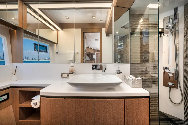 Slide: The Image of Luxurious bathroom in 2019 Galeon 650 Sky yacht with modern fixtures and ocean view. - 39