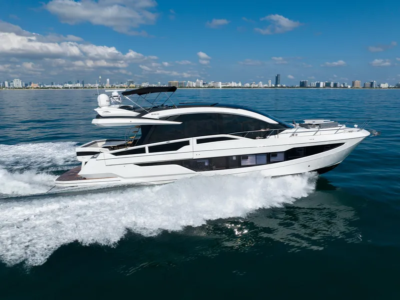 Slide: The Image of 2019 Galeon 650 Sky yacht cruising on open water. - 4