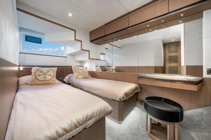 Slide: The Image of Luxurious cabin interior of 2019 Galeon 650 Sky yacht with twin beds and modern decor. - 40