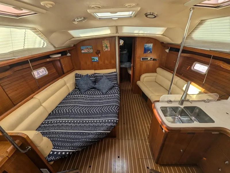 Slide: The Image of Interior of 2007 Hunter 45 CC sailboat with cozy seating and modern kitchen. - 15