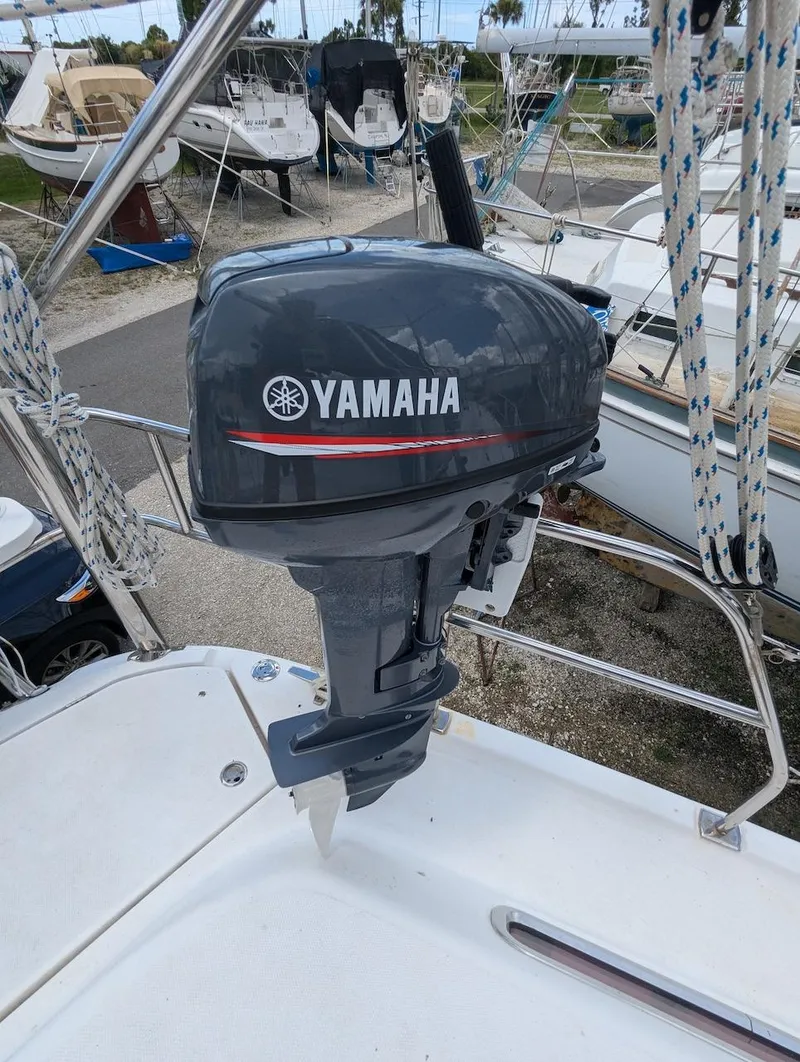Slide: The Image of Yamaha outboard motor on 2007 Hunter 45 CC sailboat deck. - 27