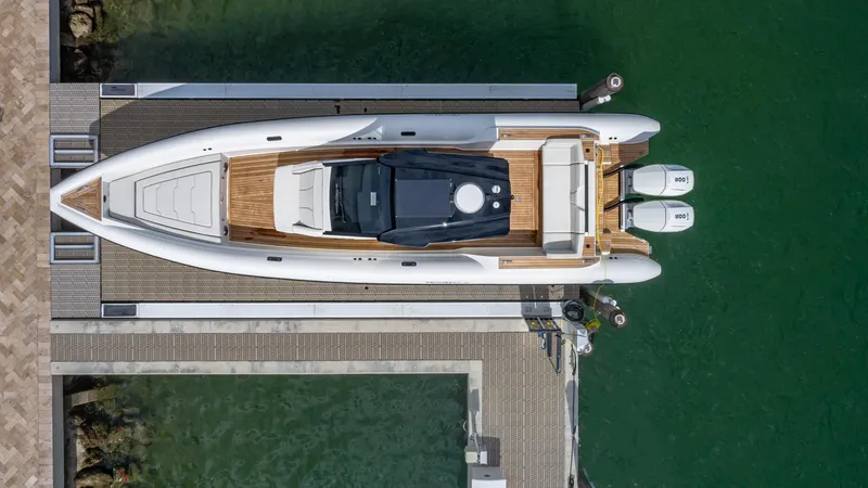 Slide: The Image of Aerial view of 2025 Technohull EXPLORER 40S yacht docked in marina. - 1