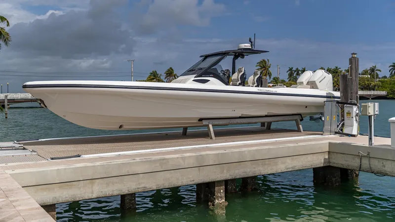 Slide: The Image of 2025 Technohull EXPLORER 40S boat docked on a sunny day. - 3