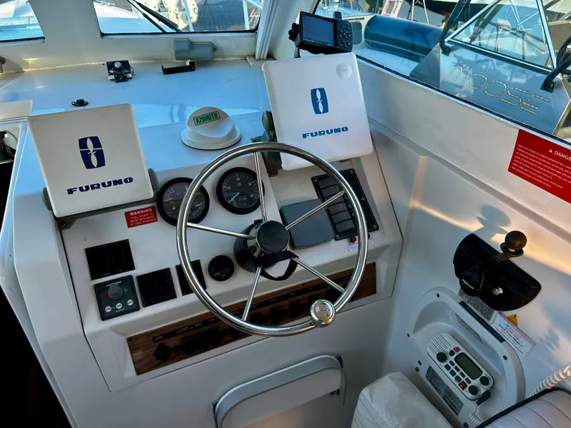 Slide: The Image of Helm of 2000 Mainship Pilot 30 Sedan with Furuno navigation equipment. - 15