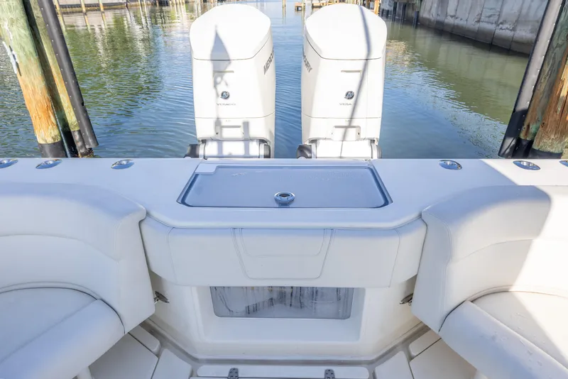 Slide: The Image of 2022 SeaVee 390Z boat with twin outboard engines at dock. - 14