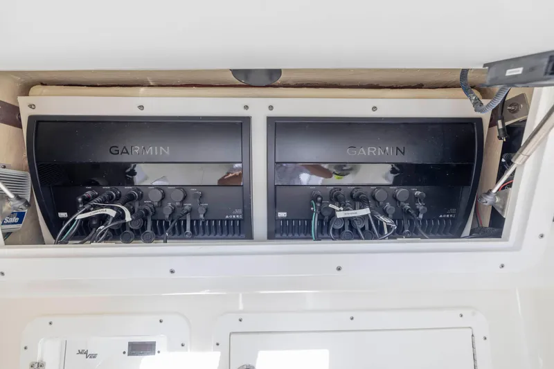 Slide: The Image of Garmin electronics on 2022 SeaVee 390Z boat dashboard. - 21