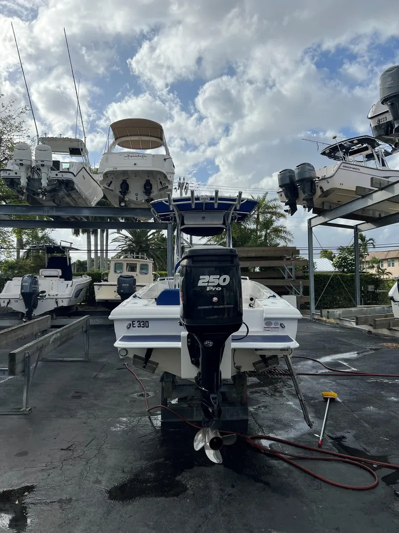 Slide: The Image of 2016 Concept 27' CC boat with 250 Pro engine in storage yard. - 20