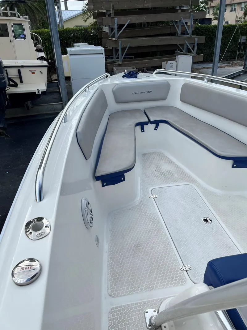 Slide: The Image of 2016 Concept 27' CC boat interior with cushioned seating and sleek design. - 3