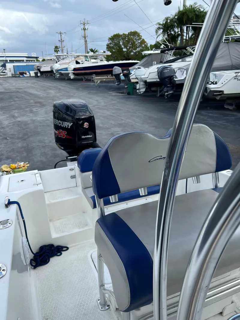 Slide: The Image of 2016 Concept 27' CC boat with Mercury outboard motor in marina setting. - 7