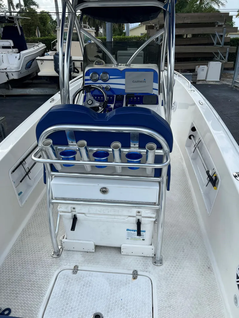 Slide: The Image of 2016 Concept 27' CC boat interior with steering console and rod holders. - 8