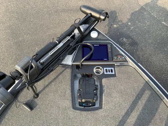 Slide: The Image of 2024 Ranger Z520R boat dashboard with advanced navigation and control systems. - 4