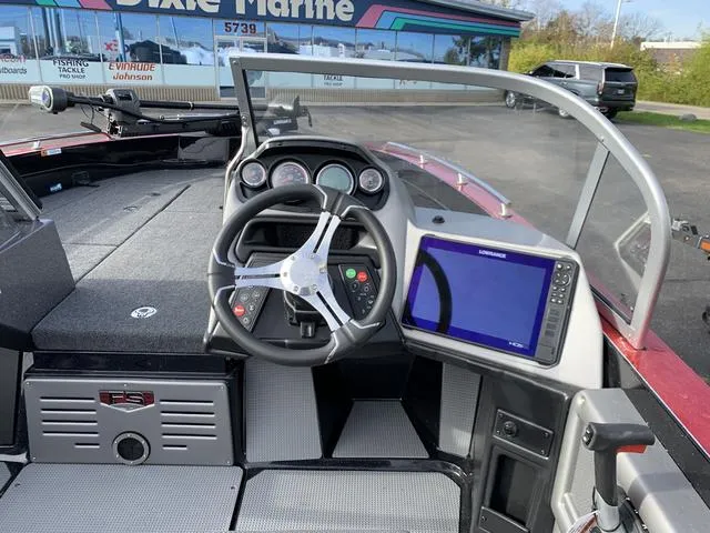 Slide: The Image of 2024 Ranger 621FS Cup boat dashboard with steering wheel and navigation system. - 5