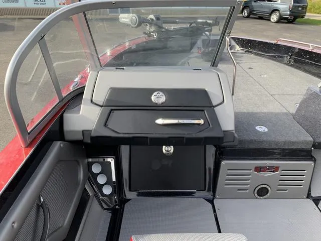 Slide: The Image of 2024 Ranger 621FS Cup boat interior with dashboard and seating. - 6