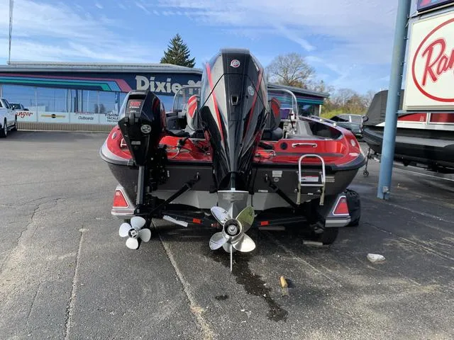 Slide: The Image of 2024 Ranger 621FS Cup boat, rear view, parked at dealership. - 8