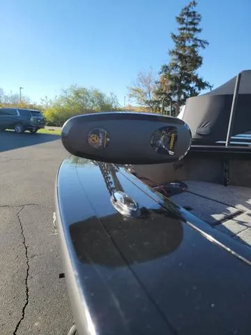 Slide: The Image of 2024 Ranger VX1888L boat with trolling motor on a sunny day. - 3