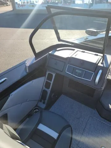 Slide: The Image of 2024 Ranger VX1888L boat interior with modern dashboard and seating. - 6