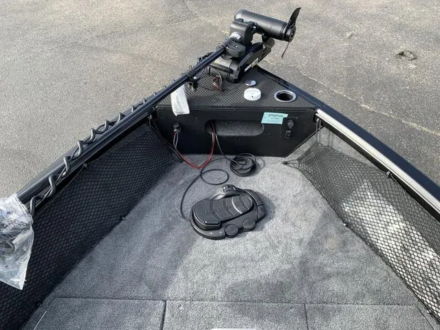 Slide: The Image of 2024 Ranger VS1882 boat deck with trolling motor and foot pedal. - 2