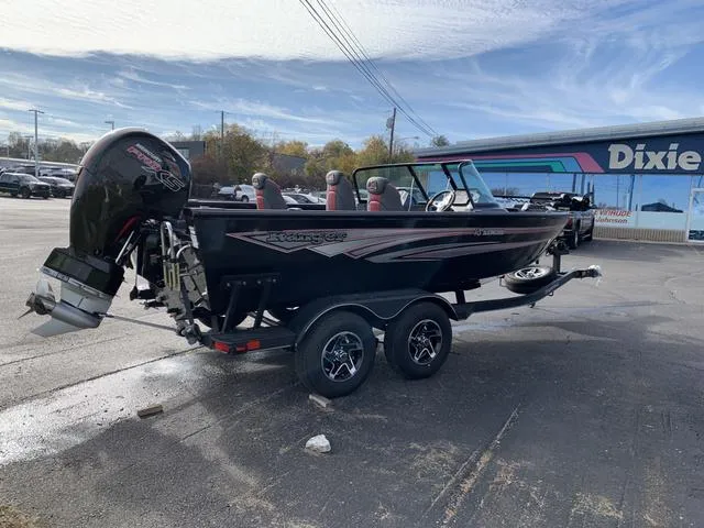 Slide: The Image of 2024 Ranger VS1882 boat on trailer, parked outside dealership. - 6