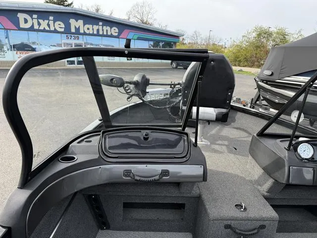 Slide: The Image of 2023 Crestliner 1750 FH boat interior at Dixie Marine dealership. - 4