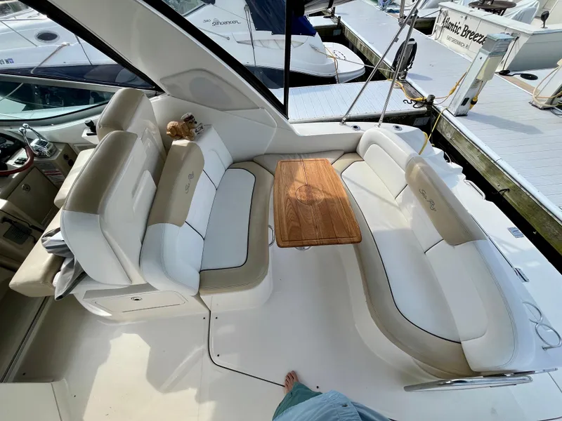 Slide: The Image of Luxurious seating area on a 2009 Sea Ray 310 Sundancer yacht. - 11