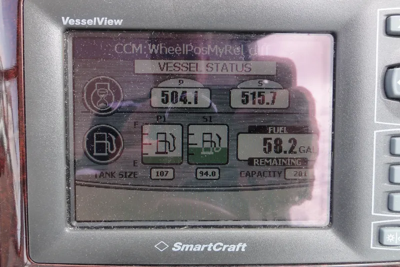Slide: The Image of SmartCraft VesselView display on 2009 Sea Ray 310 Sundancer showing fuel status and tank levels. - 39
