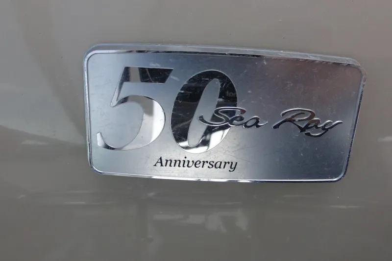 Slide: The Image of 50th Anniversary Sea Ray badge on 2009 Sea Ray 310 Sundancer boat. - 45