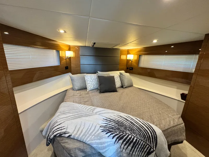 Slide: The Image of Luxurious bedroom interior of 2019 Cruisers Yachts 42 Cantius with modern decor and cozy lighting. - 24