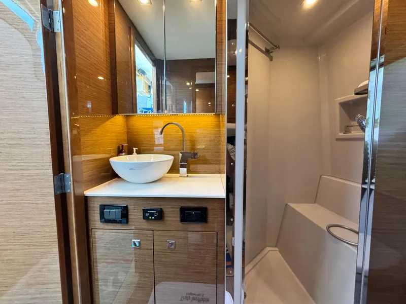 Slide: The Image of Luxurious bathroom in 2019 Cruisers Yachts 42 Cantius with modern fixtures and elegant design. - 33