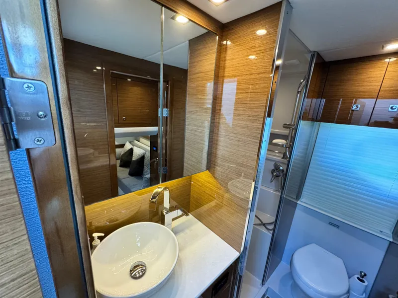 Slide: The Image of Luxurious bathroom in 2019 Cruisers Yachts 42 Cantius, featuring modern fixtures and elegant design. - 35