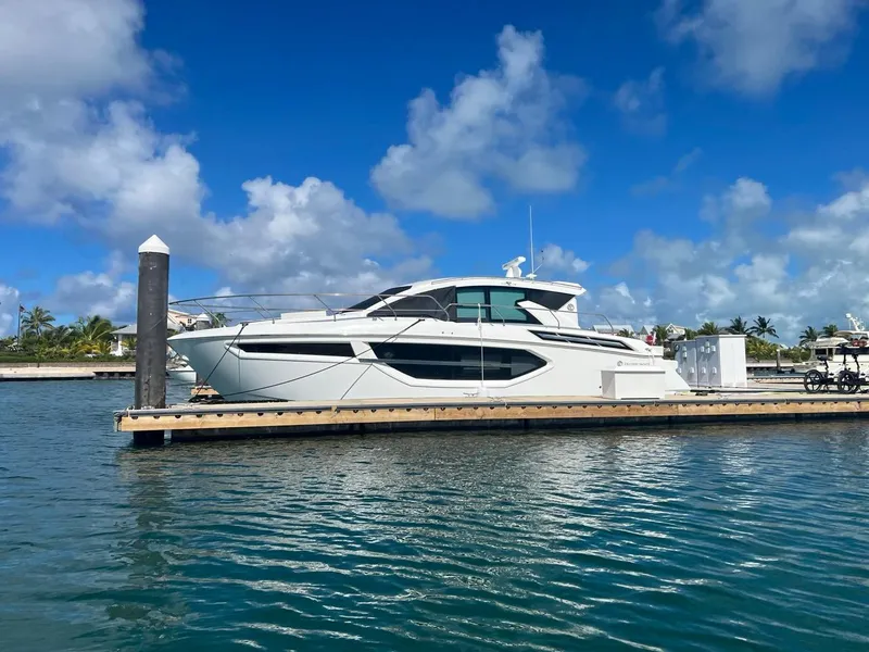 Slide: The Image of 2019 Cruisers Yachts 42 Cantius docked in a sunny marina. - 41