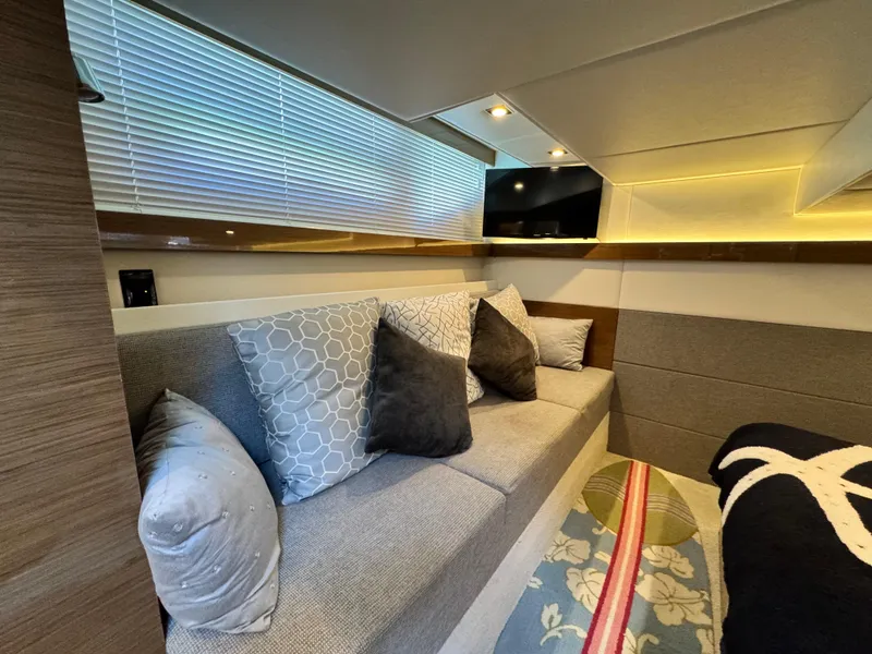 Slide: The Image of Luxurious interior of 2019 Cruisers Yachts 42 Cantius with cozy seating and modern decor. - 29