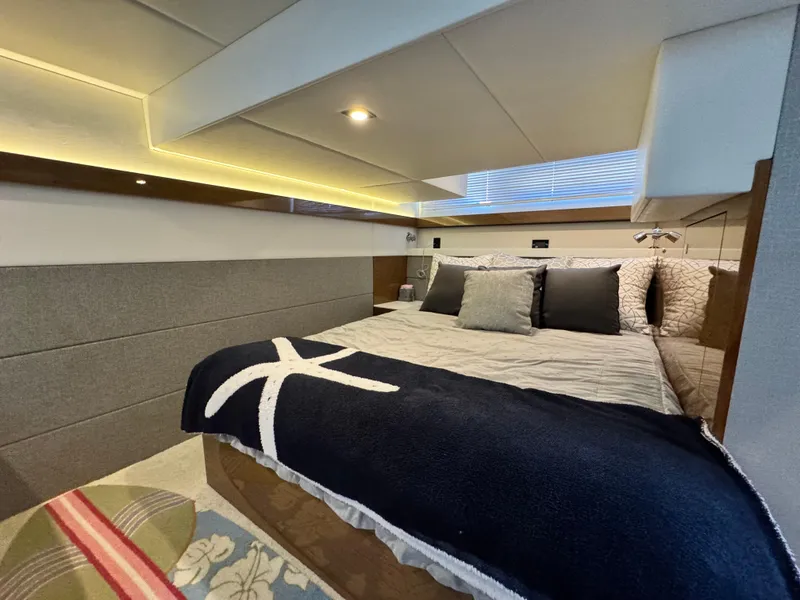 Slide: The Image of Luxurious bedroom interior of 2019 Cruisers Yachts 42 Cantius with modern design and cozy bedding. - 30