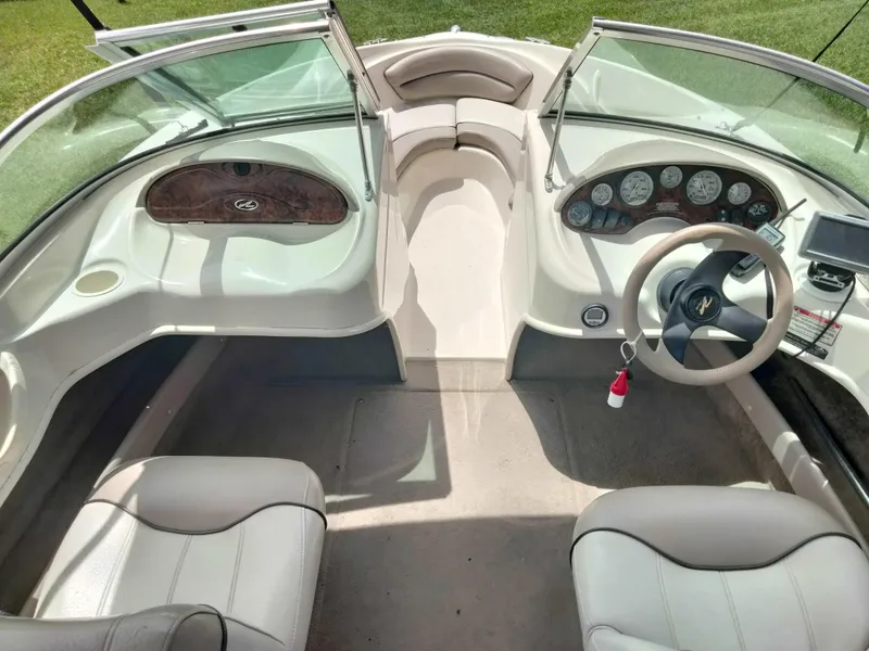 Slide: The Image of Interior view of 2002 Sea Ray 176 Bow Rider boat cockpit and seating. - 13