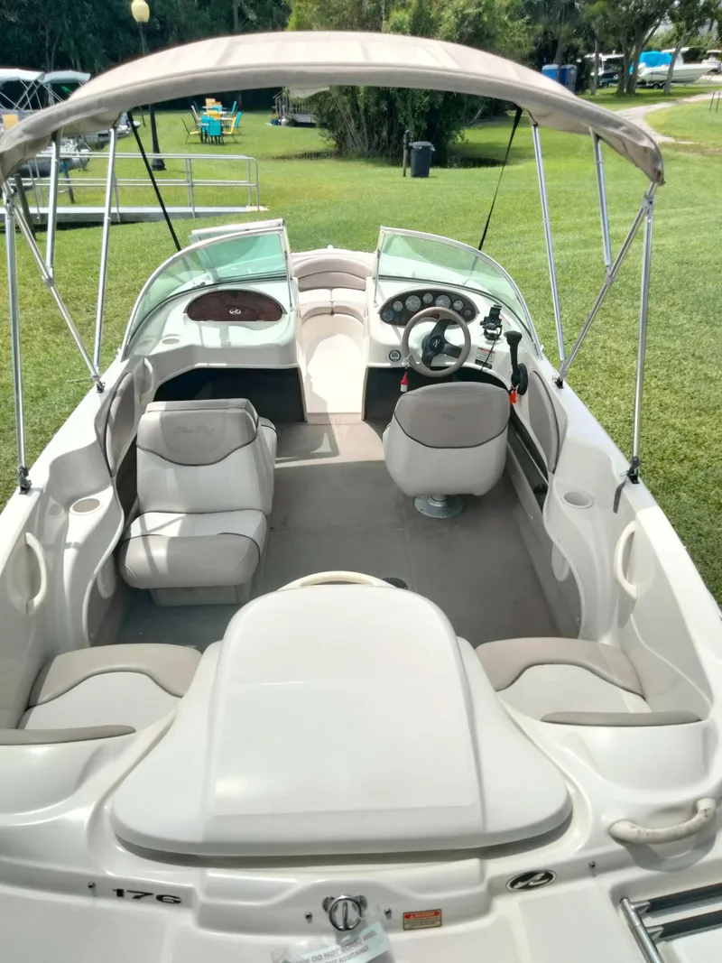 Slide: The Image of 2002 Sea Ray 176 Bow Rider boat with canopy, interior view. - 7