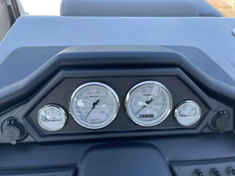 Slide: The Image of Dashboard of 2025 Bentley Pontoons Legacy 203 Navigator with gauges and controls. - 12