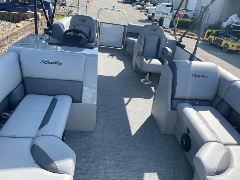 Slide: The Image of 2025 Bentley Pontoons Legacy 203 Navigator interior with luxurious seating and modern design. - 6
